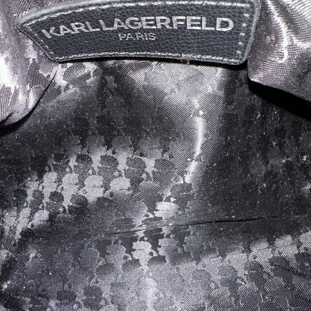 Karl Lagerfeld Paris Black Pebbled Barrel Crossbody Bag with Logo Guitar Strap - Picture 2 of 13